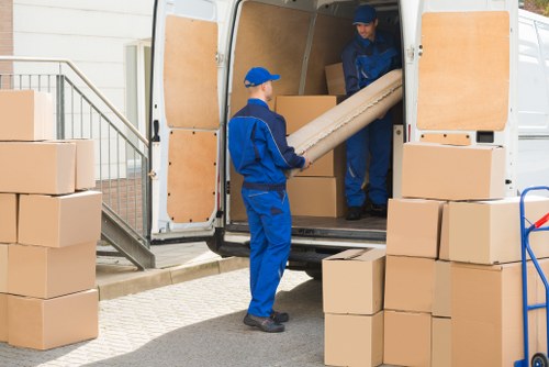 Removal team working on a Wimbledon home move near local residential streets