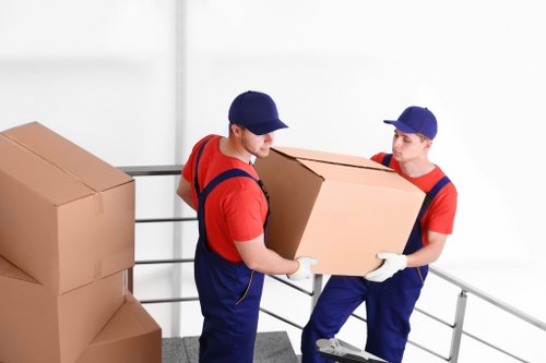 Office removals team loading business furniture in Wimbledon