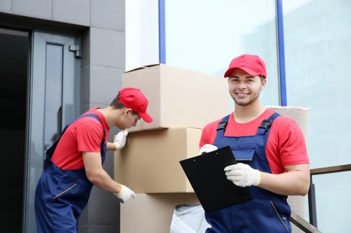 Moving van loading office furniture during a Wimbledon business relocation