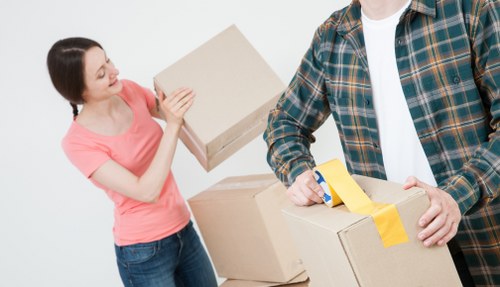 Packing materials and protected household items ready for removal services in Wimbledon