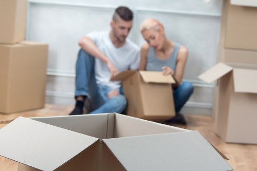 Packed office equipment ready for relocation in Wimbledon