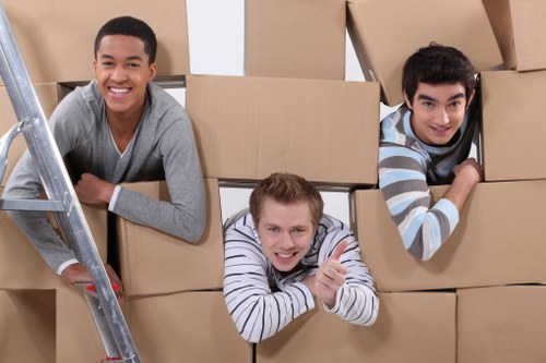 Local movers handling a flat move near Wimbledon with careful furniture protection