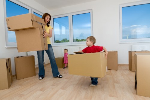 Professional movers loading household items carefully