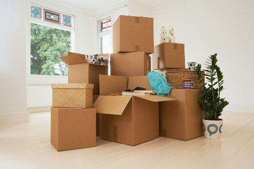 Loading furniture into a moving truck in Wimbledon