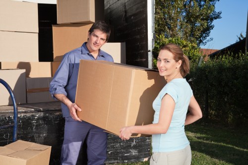 Moving boxes from a Wimbledon flat with stair access